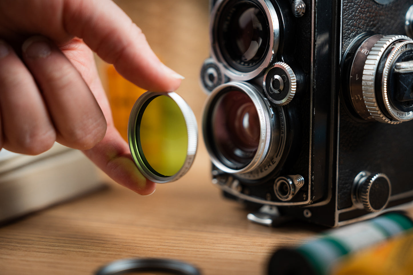 Rollei camera and a Rolleiflex metal adapter with UV filter.