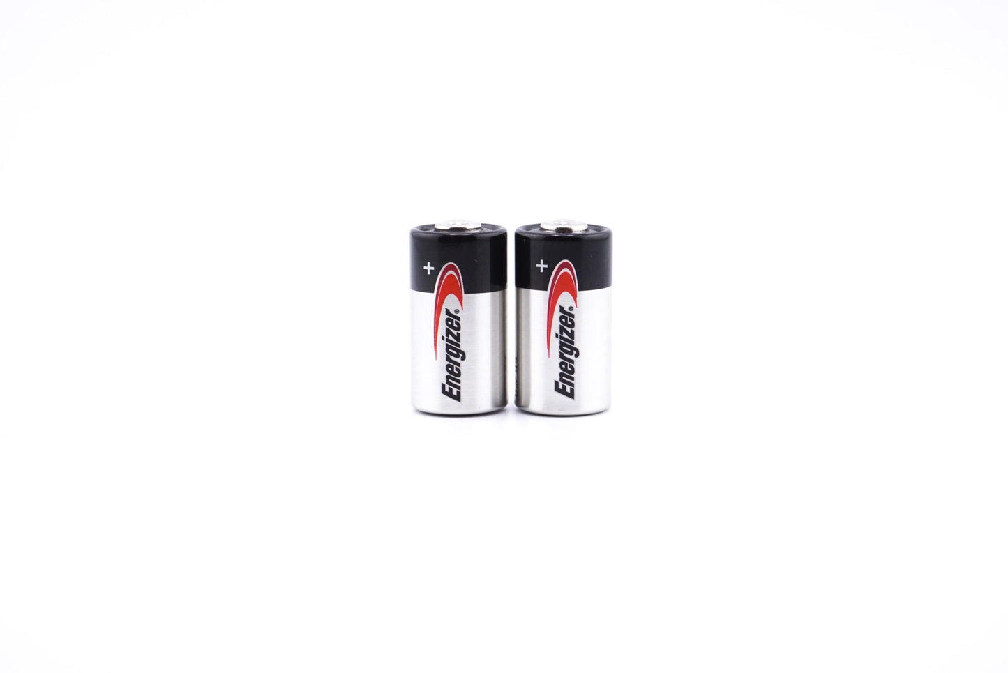 A close-up of Two Energizer 4LR44 / A544 6V batteries with a white background.