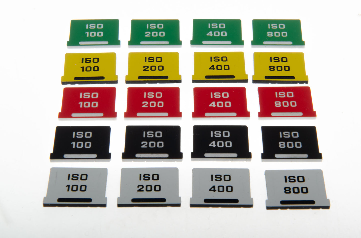 Elokuvakonepaja hot shoe ISO indicators all colors placed separately on a white background.