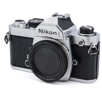 Front side view of Nikon FM film camera in silver