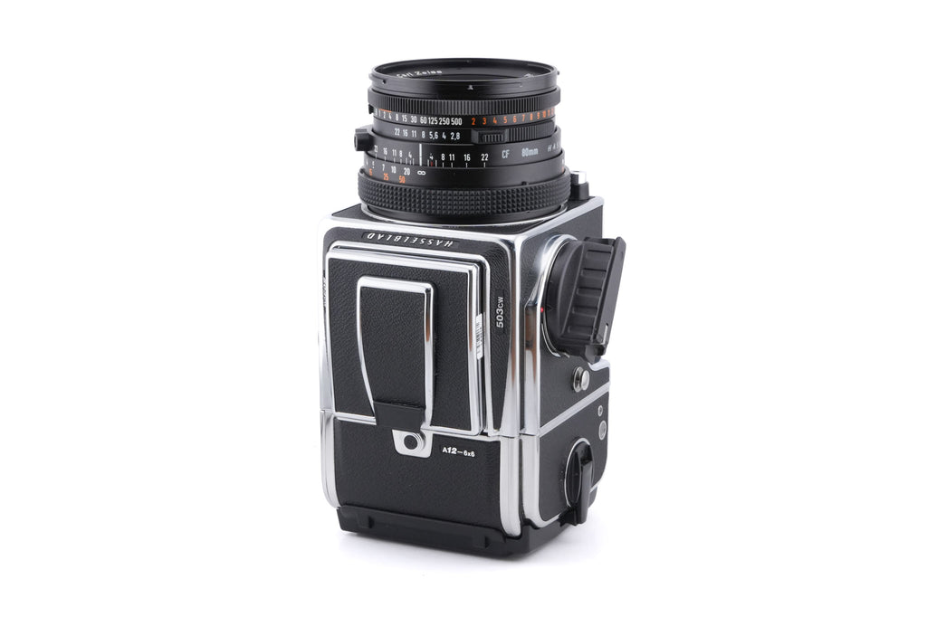 Hasselblad 503CW (Silver, 10243) + A12N Film Magazine + Waist Level Finder (New / Chrome, 42315) + Acute Matte D Microprism / Split Image Focusing Screen (42215) + 80mm f2.8 Planar T* CF (20029) + Winding Crank E (44086)