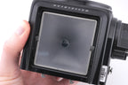 Hasselblad 500C/M (Black, 10170) + Rapid Winding Crank (44040) + A12 Film Magazine (Black, 30147) + Focusing Screen With Split-Image Rangefinder (42188) + Waist Level Finder (New / Black, 42323)