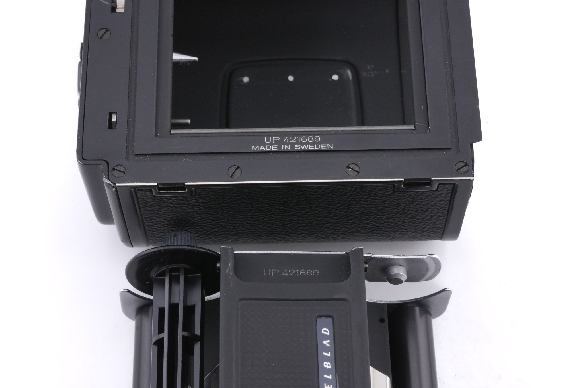 Hasselblad 500C/M (Black, 10170) + Rapid Winding Crank (44040) + A12 Film Magazine (Black, 30147) + Focusing Screen With Split-Image Rangefinder (42188) + Waist Level Finder (New / Black, 42323)