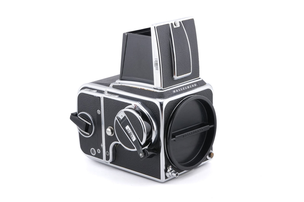 Hasselblad 500C/M (Silver, 10026) + Rapid Winding Crank (Chrome, 44016/TIRFC) + Standard Focusing Screen (42161) + A12 Film Magazine (Silver, 30074) + Waist Level Finder (Old / Silver, 42021)
