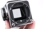 Hasselblad 500C/M (Silver, 10026) + Rapid Winding Crank (Chrome, 44016/TIRFC) + Standard Focusing Screen (42161) + A12 Film Magazine (Silver, 30074) + Waist Level Finder (Old / Silver, 42021)