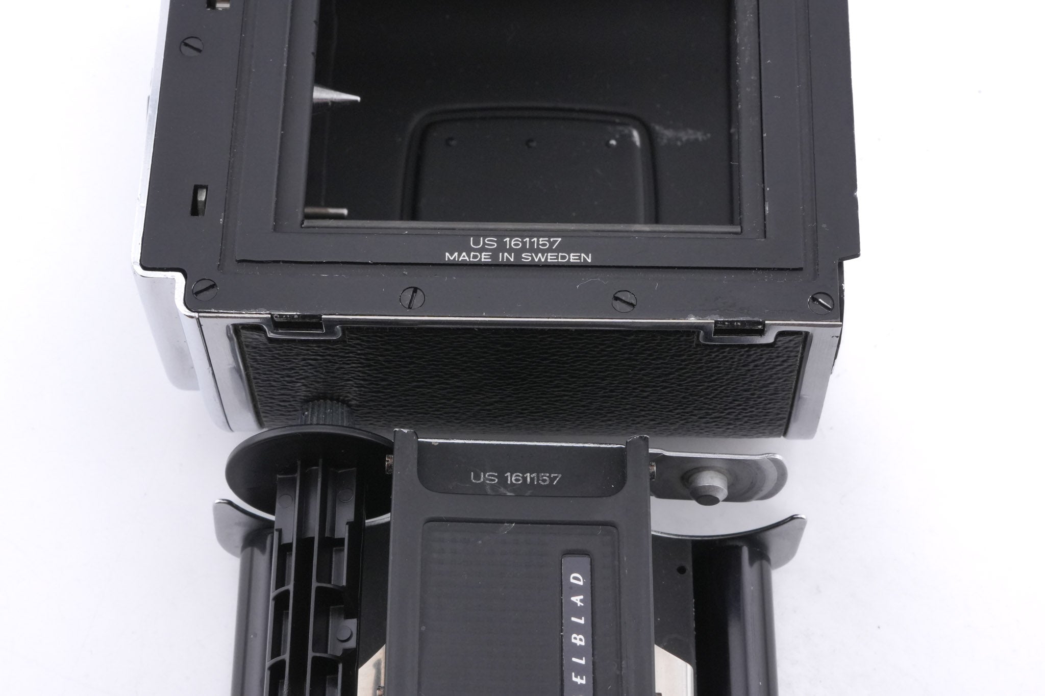 Hasselblad 500C/M (Silver, 10026) + Rapid Winding Crank (Chrome, 44016/TIRFC) + Standard Focusing Screen (42161) + A12 Film Magazine (Silver, 30074) + Waist Level Finder (Old / Silver, 42021)