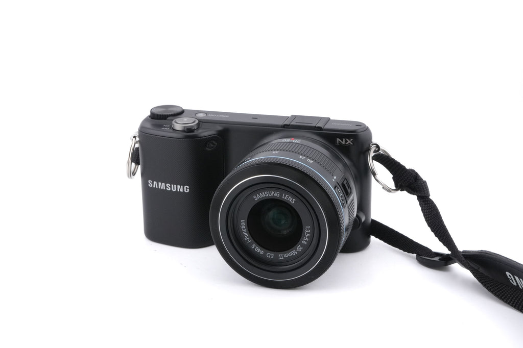 Samsung NX2000 + 20-50mm f3.5-5.6 II ED i-Function + SEF8A Flash