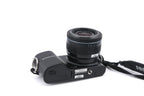 Samsung NX2000 + 20-50mm f3.5-5.6 II ED i-Function + SEF8A Flash