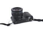 Samsung NX2000 + 20-50mm f3.5-5.6 II ED i-Function + SEF8A Flash
