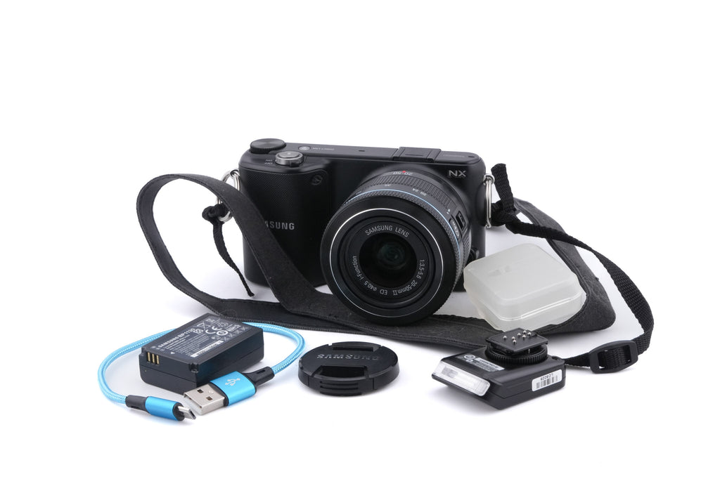 Samsung NX2000 + 20-50mm f3.5-5.6 II ED i-Function + SEF8A Flash