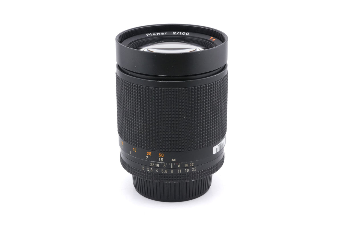 Carl Zeiss 100mm f2 Planar T* (AE) + Metal Lens Hood 4 + 67/86 Ring