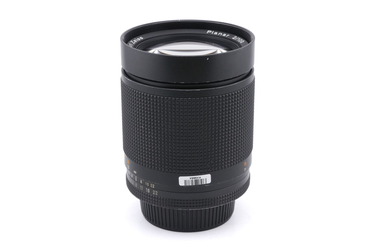 Carl Zeiss 100mm f2 Planar T* (AE) + Metal Lens Hood 4 + 67/86 Ring