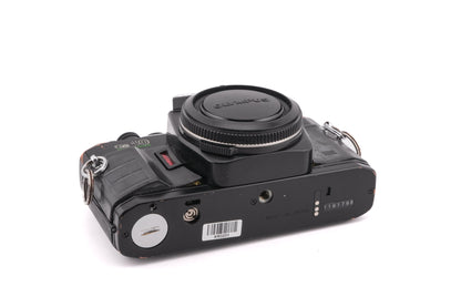 Olympus OM40 Program