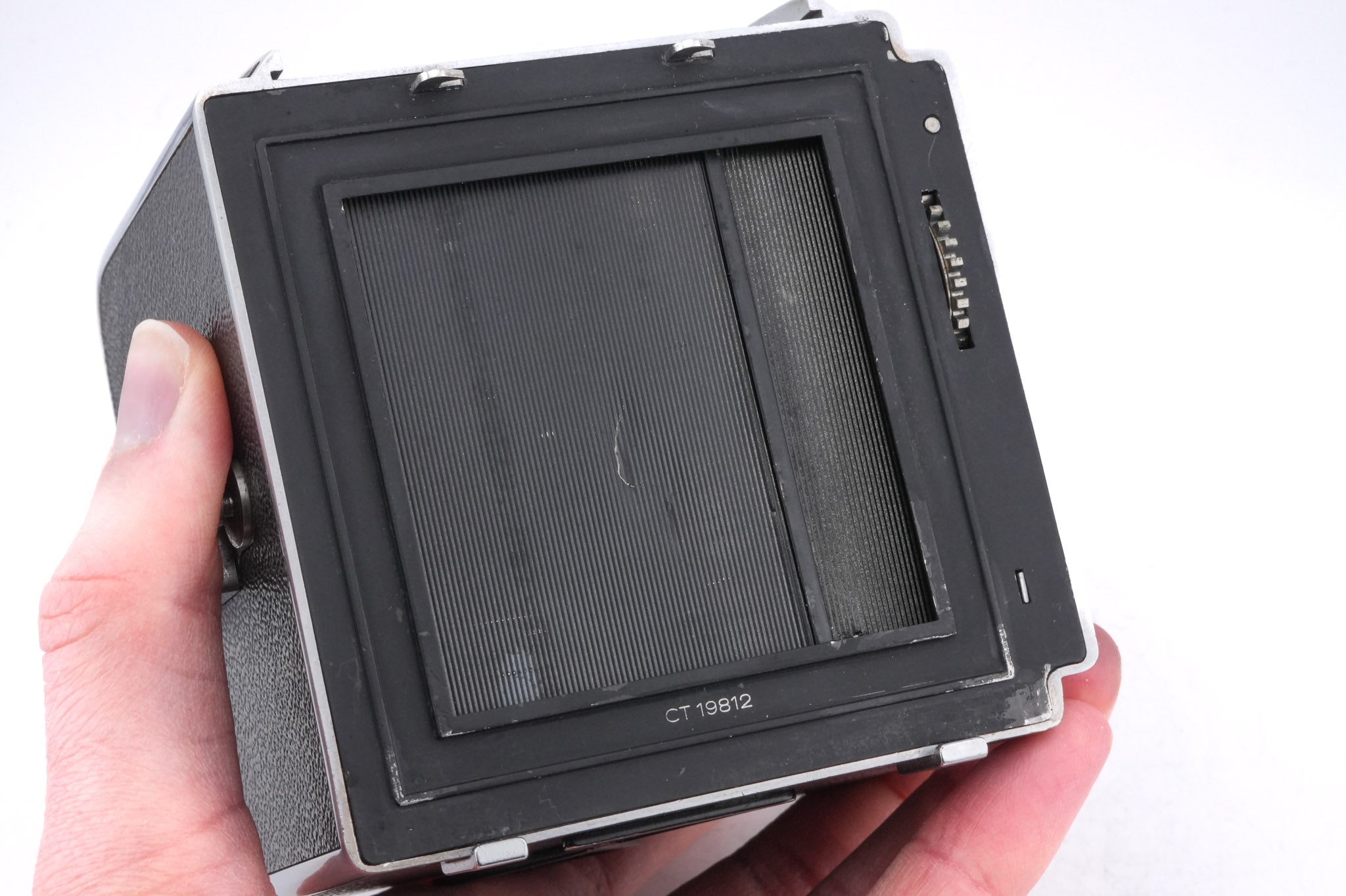 Hasselblad 1000F (8012) + 80mm f2.8 Tessar T Opton (OBTU / 8055) + 12 Film Magazine + Waist Level Finder (FUJUC)