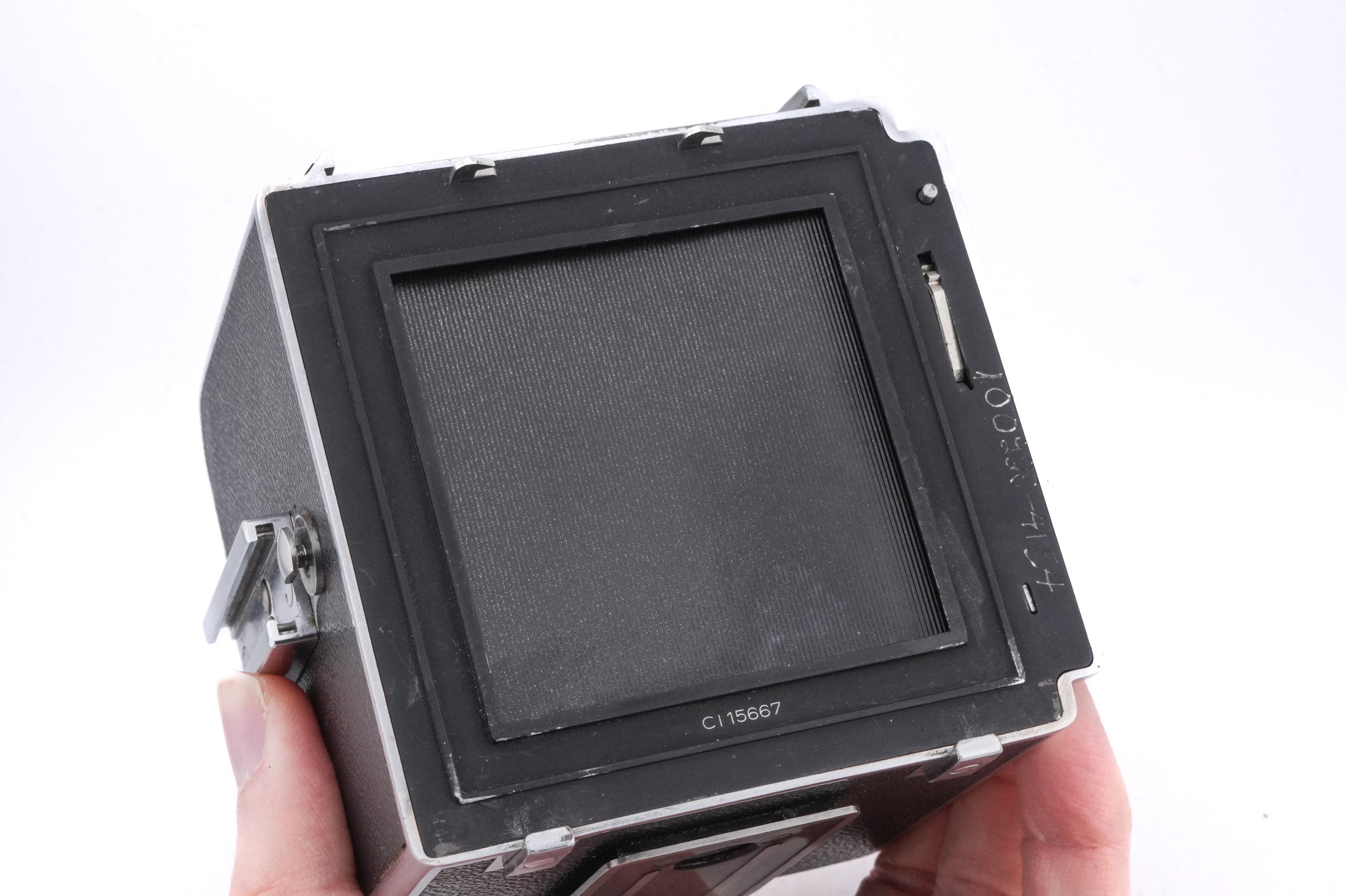 Hasselblad 1000F (8012) + Waist Level Finder (FUJUC) + 80mm f2.8 Tessar T Opton (OBTU / 8055) + 12 Film Magazine