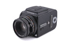 Hasselblad 500C/M (Black, 10170) + 80mm f2.8 Planar T* CF (20029) + Waist Level Finder (Old / Black, 42277) + Standard Winding Knob (44024) + A12 Film Magazine (Black, 30147) + Standard Focusing Screen (42161)