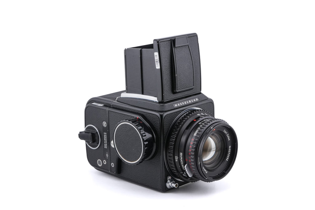 Hasselblad 500C/M (Black, 10170) + Acute Matte D Grid / Split Image Focusing Screen (42217) + A12N Film Magazine + 80mm f2.8 Planar T* C (Black, 20028) + Waist Level Finder (New / Black, 42323)