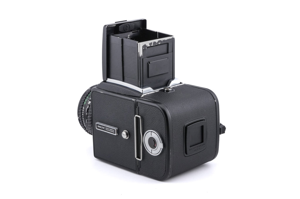 Hasselblad 500C/M (Black, 10170) + Acute Matte D Grid / Split Image Focusing Screen (42217) + A12N Film Magazine + 80mm f2.8 Planar T* C (Black, 20028) + Waist Level Finder (New / Black, 42323)