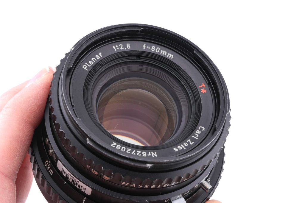 Hasselblad 500C/M (Black, 10170) + Acute Matte D Grid / Split Image Focusing Screen (42217) + A12N Film Magazine + 80mm f2.8 Planar T* C (Black, 20028) + Waist Level Finder (New / Black, 42323)