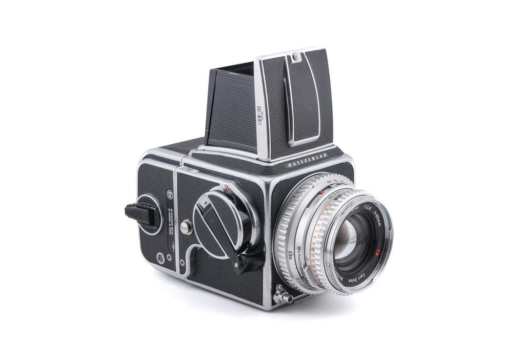 Hasselblad 500C/M (Silver, 10026) + 80mm f2.8 Planar T* C (Silver, 20028) + Waist Level Finder (Old / Silver, 42021) + Standard Focusing Screen (42161) + A12 Film Magazine (Silver, 30074)