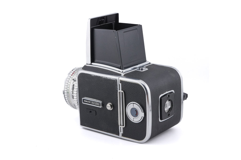 Hasselblad 500C/M (Silver, 10026) + 80mm f2.8 Planar T* C (Silver, 20028) + Waist Level Finder (Old / Silver, 42021) + Standard Focusing Screen (42161) + A12 Film Magazine (Silver, 30074)