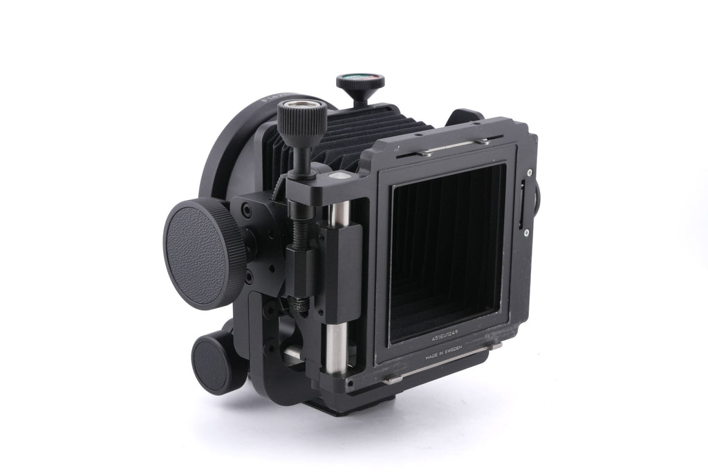 Hasselblad FlexBody (72109) + Stray Light Protection Slide (72411) + Film Format 4x5 Mask  (41151) + Open L-Connector (50776) + Focusing Screen Adapter (72405) + Reflex Viewfinder RMfx (72530) + FlexBody Cable Release (72513) + 10° Correction Slide (72413