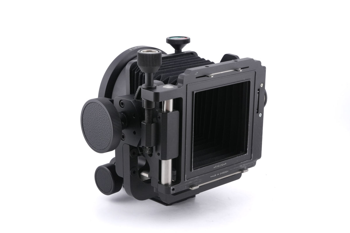 Hasselblad FlexBody (72109) + Stray Light Protection Slide (72411) + Film Format 4x5 Mask  (41151) + Open L-Connector (50776) + Focusing Screen Adapter (72405) + Reflex Viewfinder RMfx (72530) + FlexBody Cable Release (72513) + 10° Correction Slide (72413