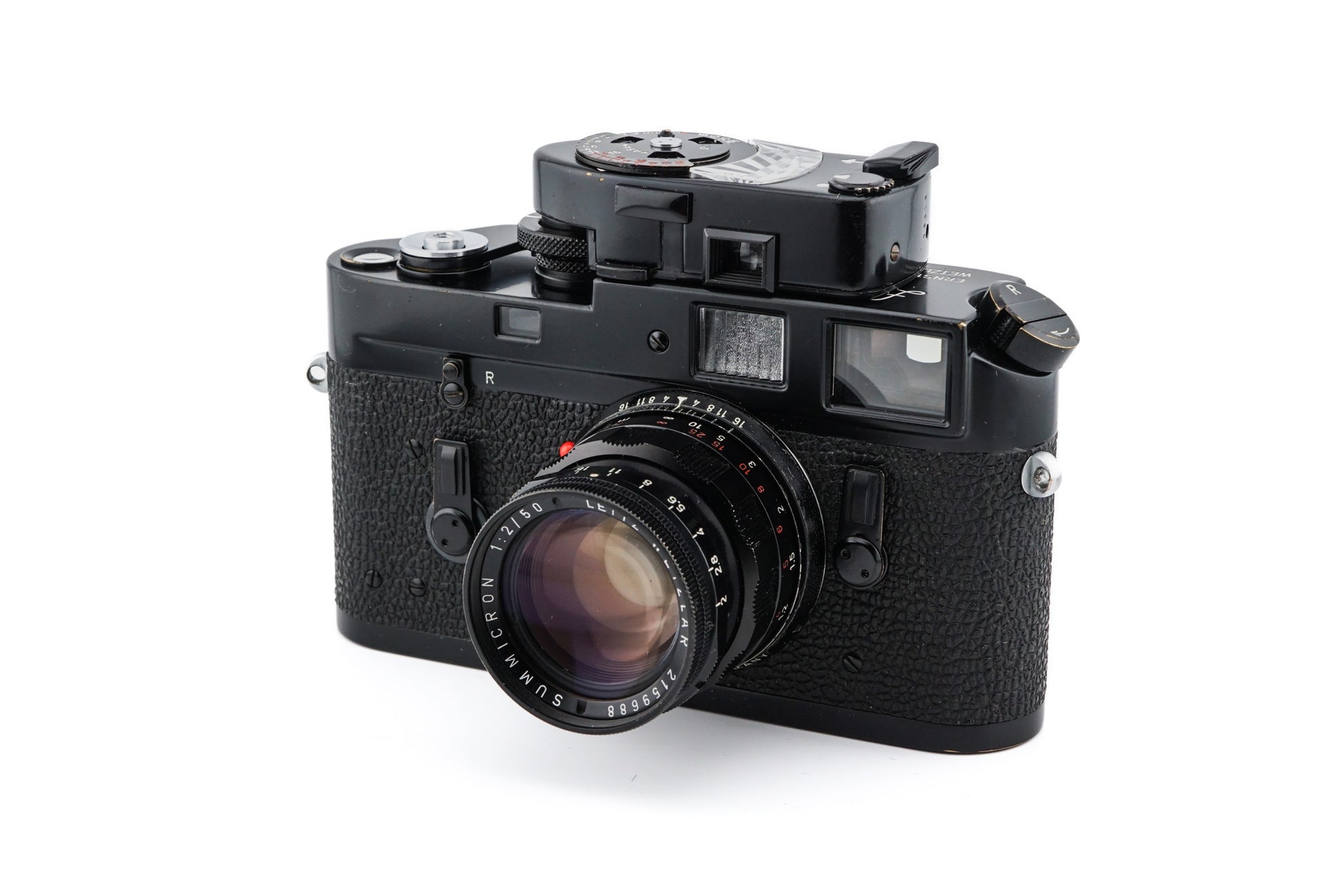 Front view of a black paint leica M4 from the first production batch, with mathcing summicron lens and leicameter