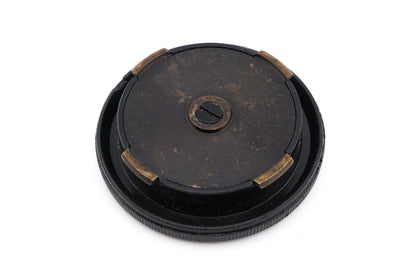 Back view of brass leica body cap for original black paint leica cameras