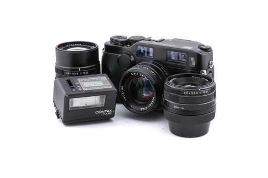 Contax G2 (Black) + 45mm f2 Planar T* (Black) + 28mm f2.8 Biogon T* (Black) + 90mm f2.8 Sonnar T* (Black)