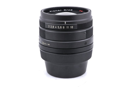 Contax G2 (Black) + 45mm f2 Planar T* (Black) + 28mm f2.8 Biogon T* (Black) + 90mm f2.8 Sonnar T* (Black)