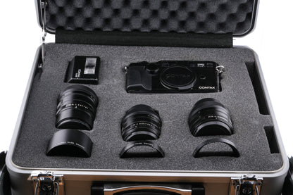 Contax G2 (Black) + 45mm f2 Planar T* (Black) + 28mm f2.8 Biogon T* (Black) + 90mm f2.8 Sonnar T* (Black)