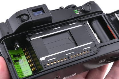 Contax G2 (Black) + 45mm f2 Planar T* (Black) + 28mm f2.8 Biogon T* (Black) + 90mm f2.8 Sonnar T* (Black)