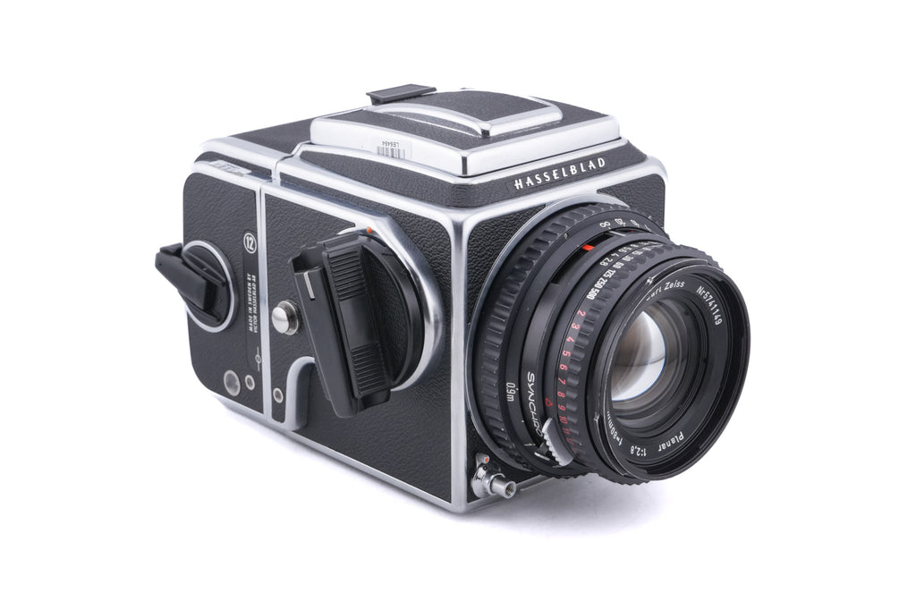 Hasselblad 500C/M (Silver, 10026) + 80mm f2.8 Planar T* C (Black, 20028) + Waist Level Finder (New / Chrome, 42315) + A12N Film Magazine + Acute Matte Focusing Screen (42165)