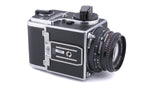 Hasselblad 500C/M (Silver, 10026) + 80mm f2.8 Planar T* C (Black, 20028) + Waist Level Finder (New / Chrome, 42315) + A12N Film Magazine + Acute Matte Focusing Screen (42165)