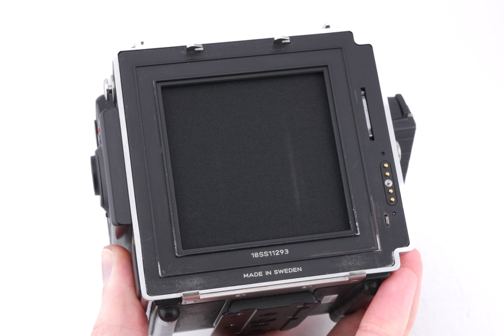 Hasselblad 203FE (Millennium) (Silver, 12041) + E12 Film Magazine (Chrome, 30244) + Waist Level Finder (Silver, 42317) + Acute Matte Grid / Split Image Focusing Screen (42170)