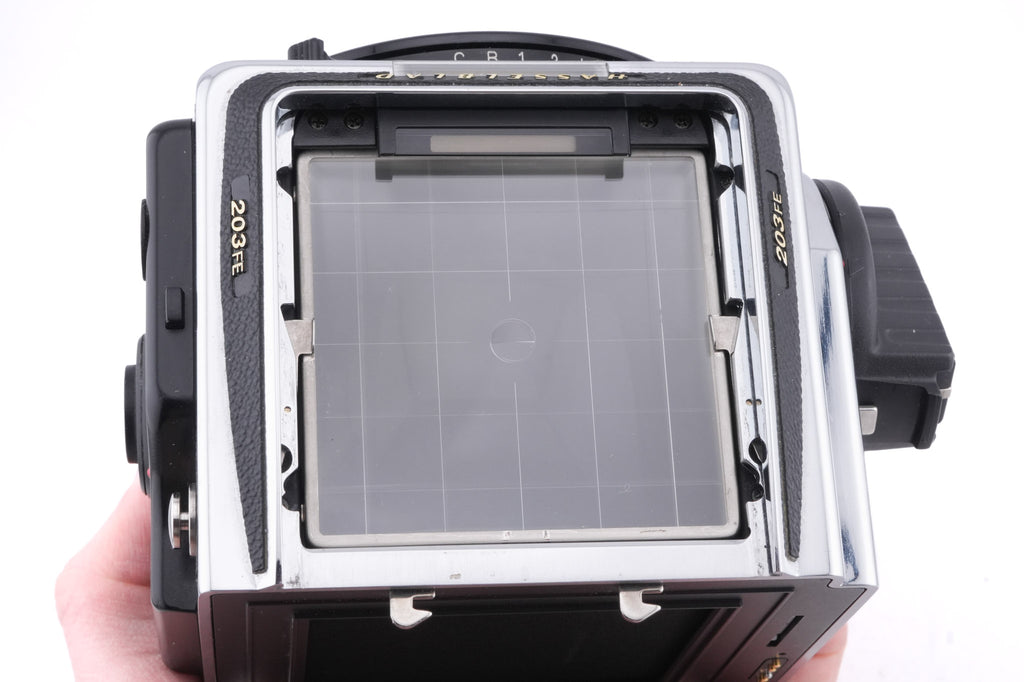 Hasselblad 203FE (Millennium) (Silver, 12041) + E12 Film Magazine (Chrome, 30244) + Waist Level Finder (Silver, 42317) + Acute Matte Grid / Split Image Focusing Screen (42170)