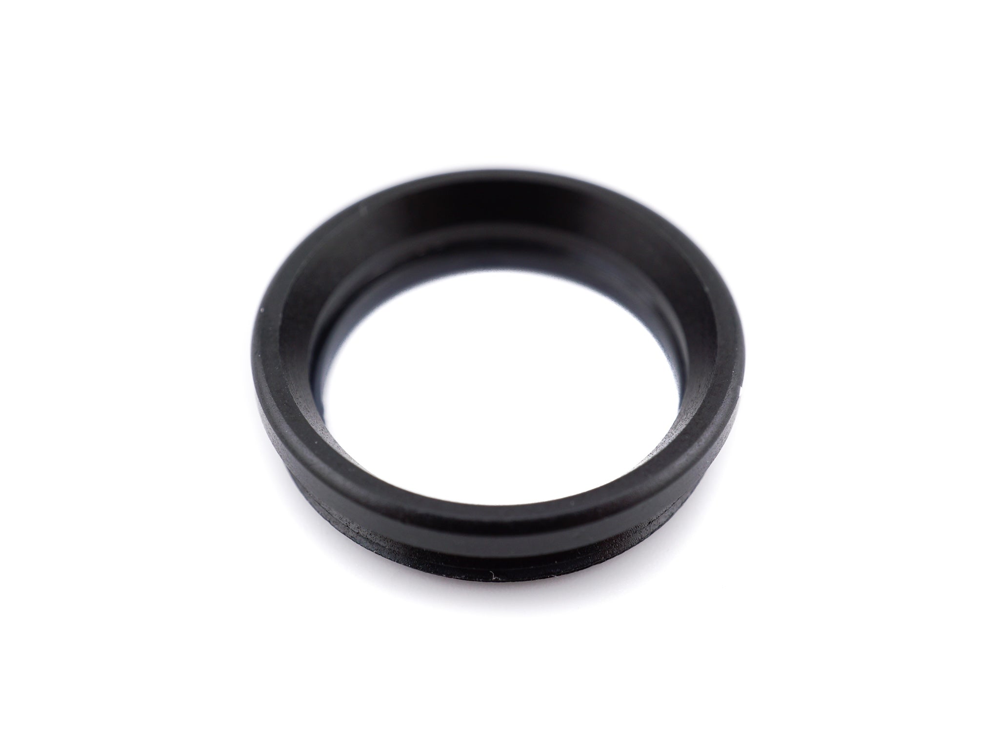 A close-up of a black aluminium 19mm eyepiece with white background. 