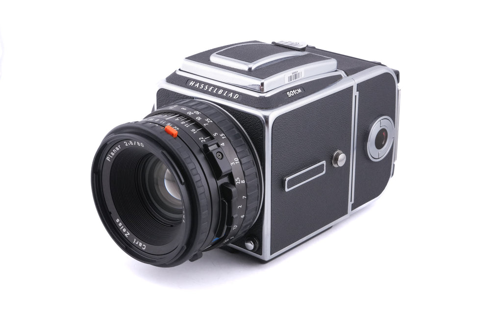 Hasselblad 501CM (Silver, 10238) + 80mm f2.8 Planar T* CFE (20034) + Acute Matte D Grid / Split Image Focusing Screen (42217) + A12N Film Magazine + Waist Level Finder (New / Chrome, 42315)