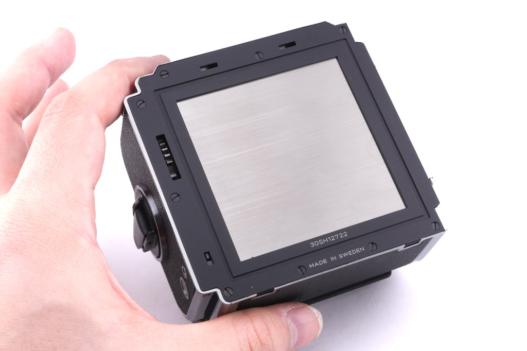 Hasselblad 501CM (Silver, 10238) + 80mm f2.8 Planar T* CFE (20034) + Acute Matte D Grid / Split Image Focusing Screen (42217) + A12N Film Magazine + Waist Level Finder (New / Chrome, 42315)