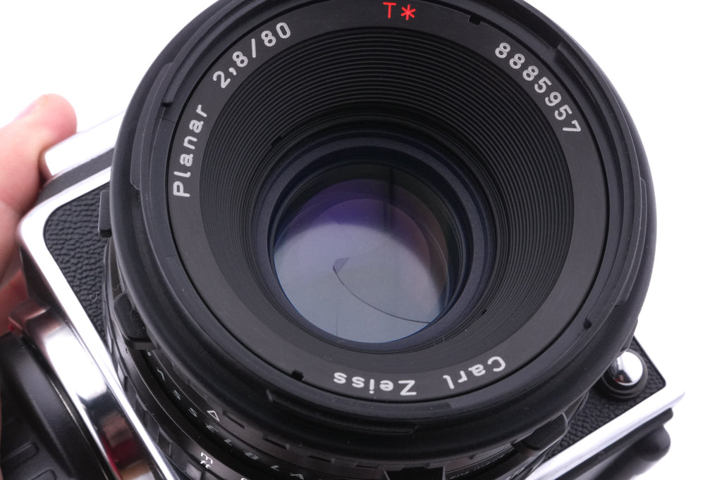 Hasselblad 501CM (Silver, 10238) + 80mm f2.8 Planar T* CFE (20034) + Acute Matte D Grid / Split Image Focusing Screen (42217) + A12N Film Magazine + Waist Level Finder (New / Chrome, 42315)