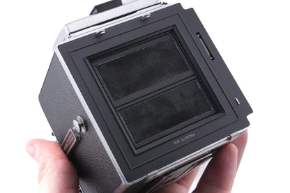 Hasselblad 500C/M (Silver, 10026) + 80mm f2.8 Planar T* CF (20029) + A12 Film Magazine (Silver, 30074) + Waist Level Finder (New / Chrome, 42315) + Acute Matte Focusing Screen (42165)