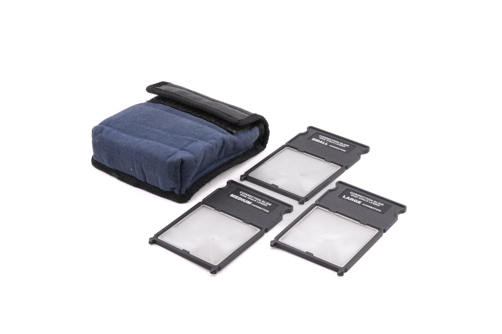 Hasselblad ArcBody (17015) + 45mm f4.5 APO-Grandagon (27045) + Focusing Screen Adapter Standard (41057) + Reflex Viewfinder RMFX (47070) + Small Correction Slide (47003) + Medium Correction Slide (47007) + Large Correction Slide (47011) + Cable Release (5