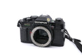 Olympus OM40 Program