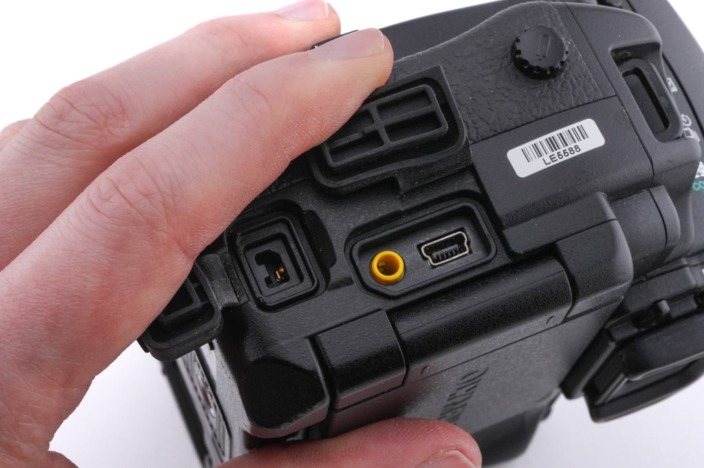 Olympus E-3 + HLD-4 Power Battery Holder