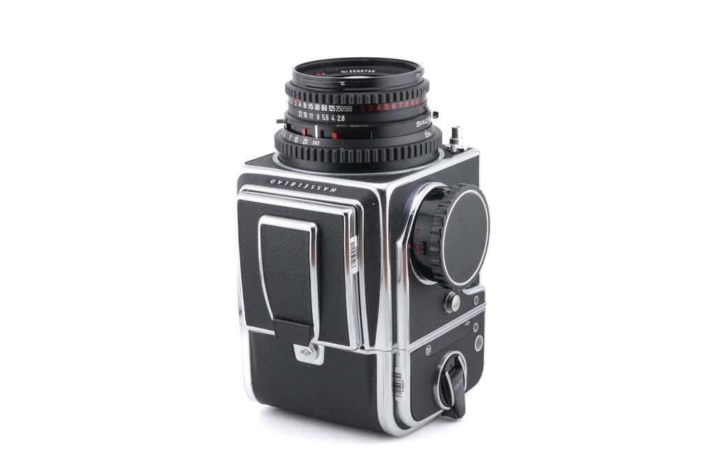 Hasselblad 500C/M (Silver, 10026) + A12 Film Magazine (Silver, 30074) + Waist Level Finder (New / Chrome, 42315) + Standard Focusing Screen (42161) + 80mm f2.8 Opton PL T*