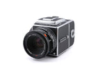 Hasselblad 501CM (Silver, 10238) + Waist Level Finder (New / Chrome, 42315) + 80mm f2.8 Planar T* CFE (20034) + A12N Film Magazine + Acute Matte D Microprism / Split Image Focusing Screen (42215)