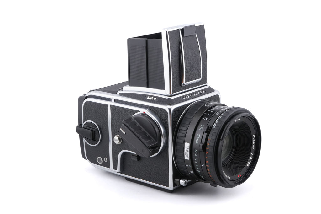 Hasselblad 501CM (Silver, 10238) + Waist Level Finder (New / Chrome, 42315) + 80mm f2.8 Planar T* CFE (20034) + A12N Film Magazine + Acute Matte D Microprism / Split Image Focusing Screen (42215)