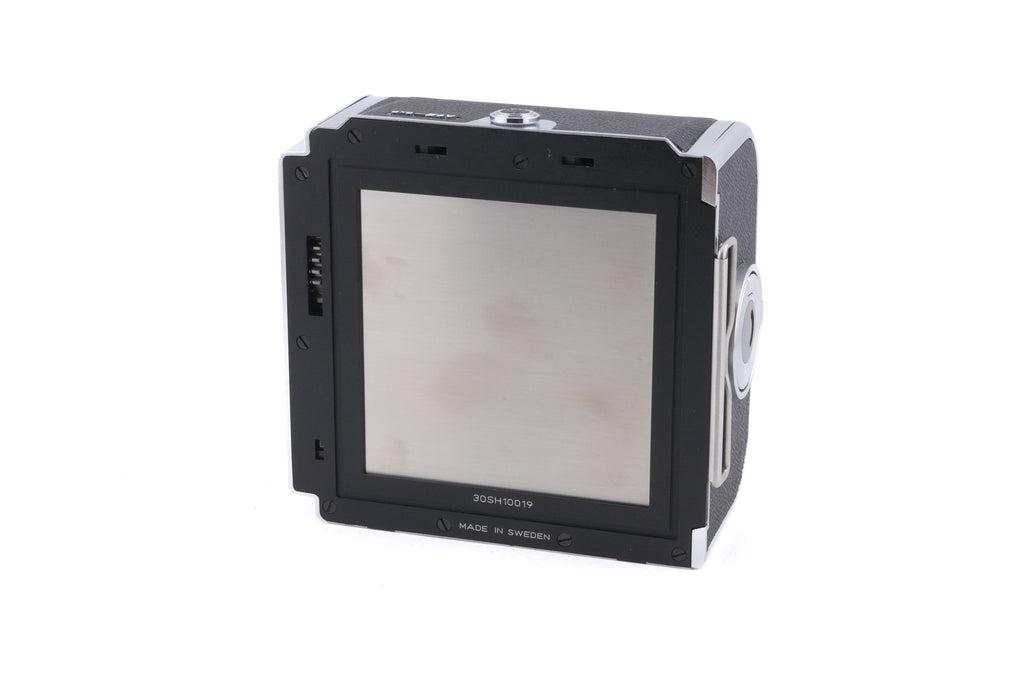 Hasselblad 501CM (Silver, 10238) + Waist Level Finder (New / Chrome, 42315) + 80mm f2.8 Planar T* CFE (20034) + A12N Film Magazine + Acute Matte D Microprism / Split Image Focusing Screen (42215)