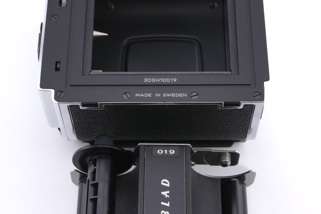 Hasselblad 501CM (Silver, 10238) + Waist Level Finder (New / Chrome, 42315) + 80mm f2.8 Planar T* CFE (20034) + A12N Film Magazine + Acute Matte D Microprism / Split Image Focusing Screen (42215)